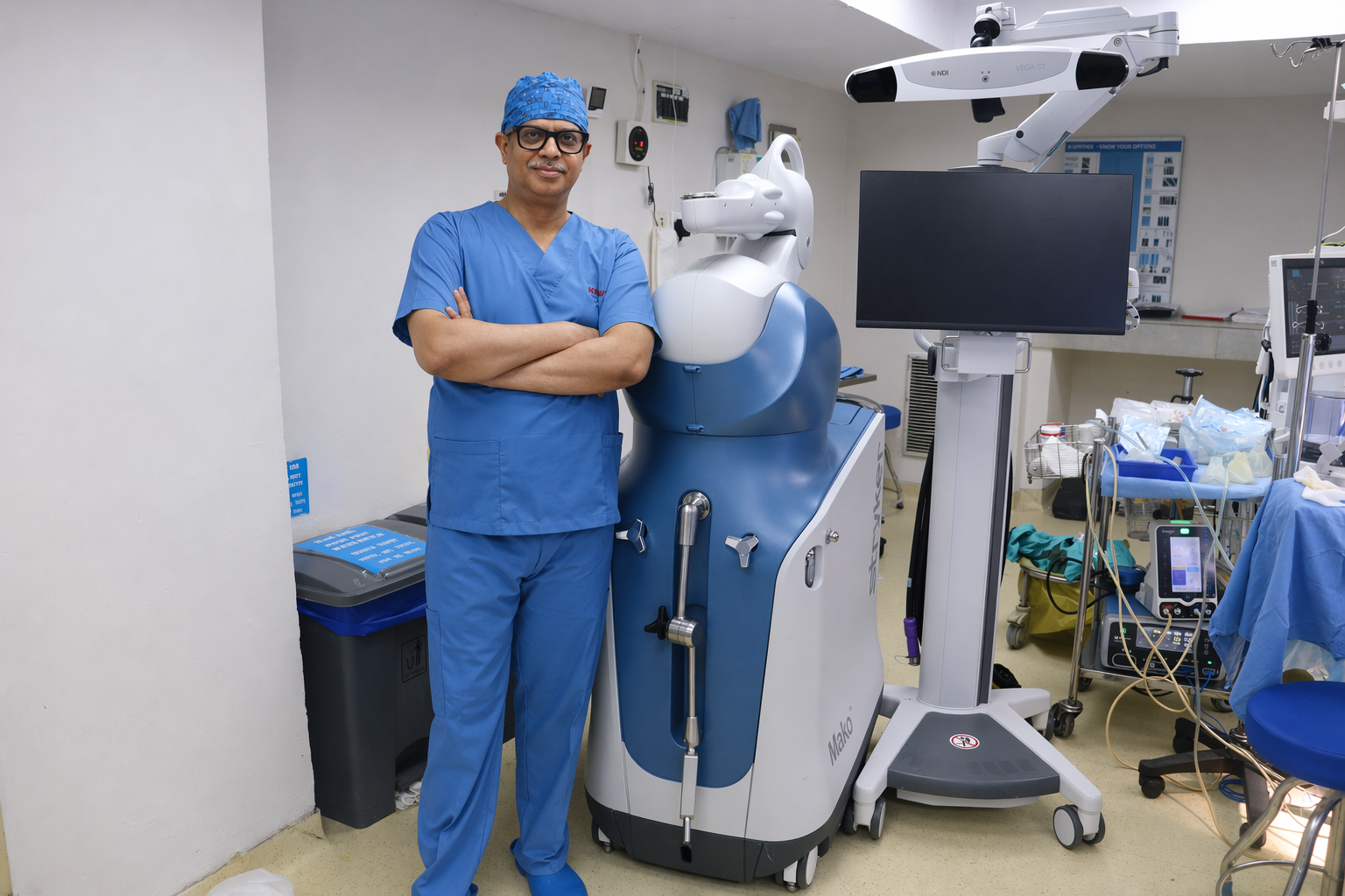 Dr. Dhananjay Gupta with robotic surgical system